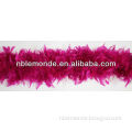 Party backdrop decoration of turkey feather, pink feather boa, wedding feather boa